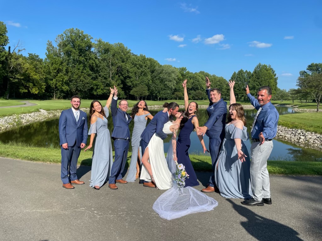 Wedding kiss by the lake 
